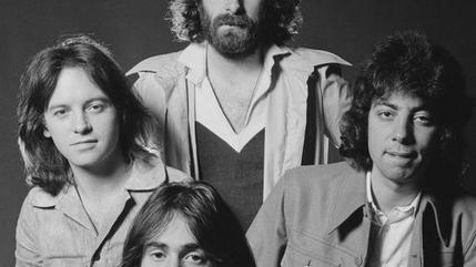 Promotional photograph of Band 10cc.