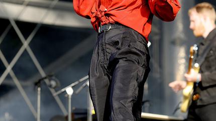 Promotional photograph of Christine and the Queens live.