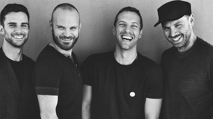 Promotional photograph of Coldplay.