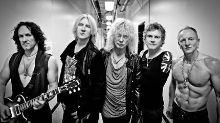 Promotional photograph of Def Leppard.