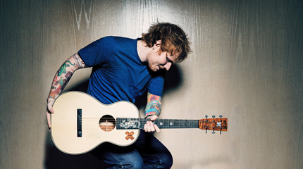 Promotional photograph of Foto de Ed Sheeran con su guitarra.
