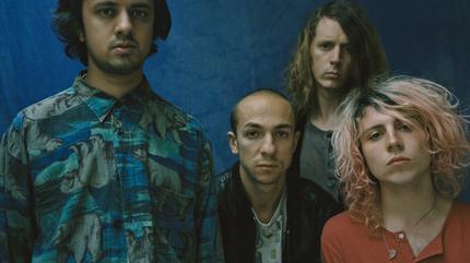 Promotional photograph of Mystery Jets.
