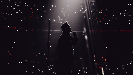 Promofoto von Foto de The Weeknd en concierto.