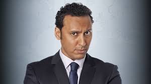 Promotional photograph of Aasif Mandvi.