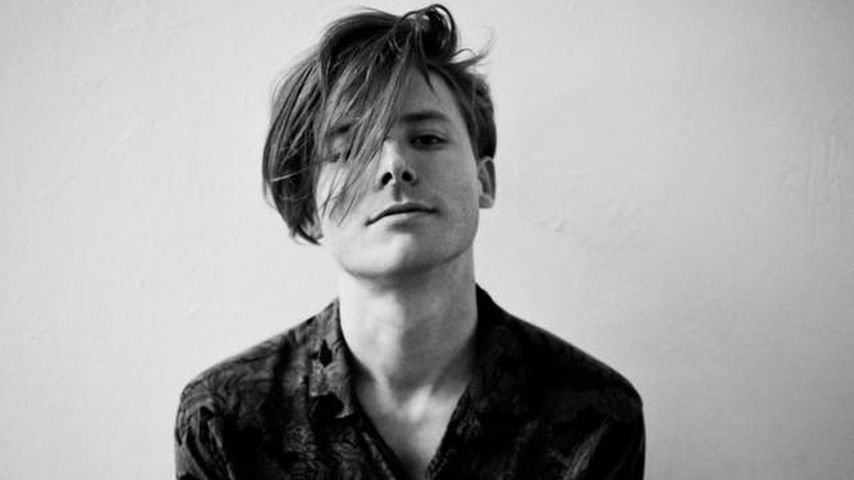 Promotional photograph of Adam French.