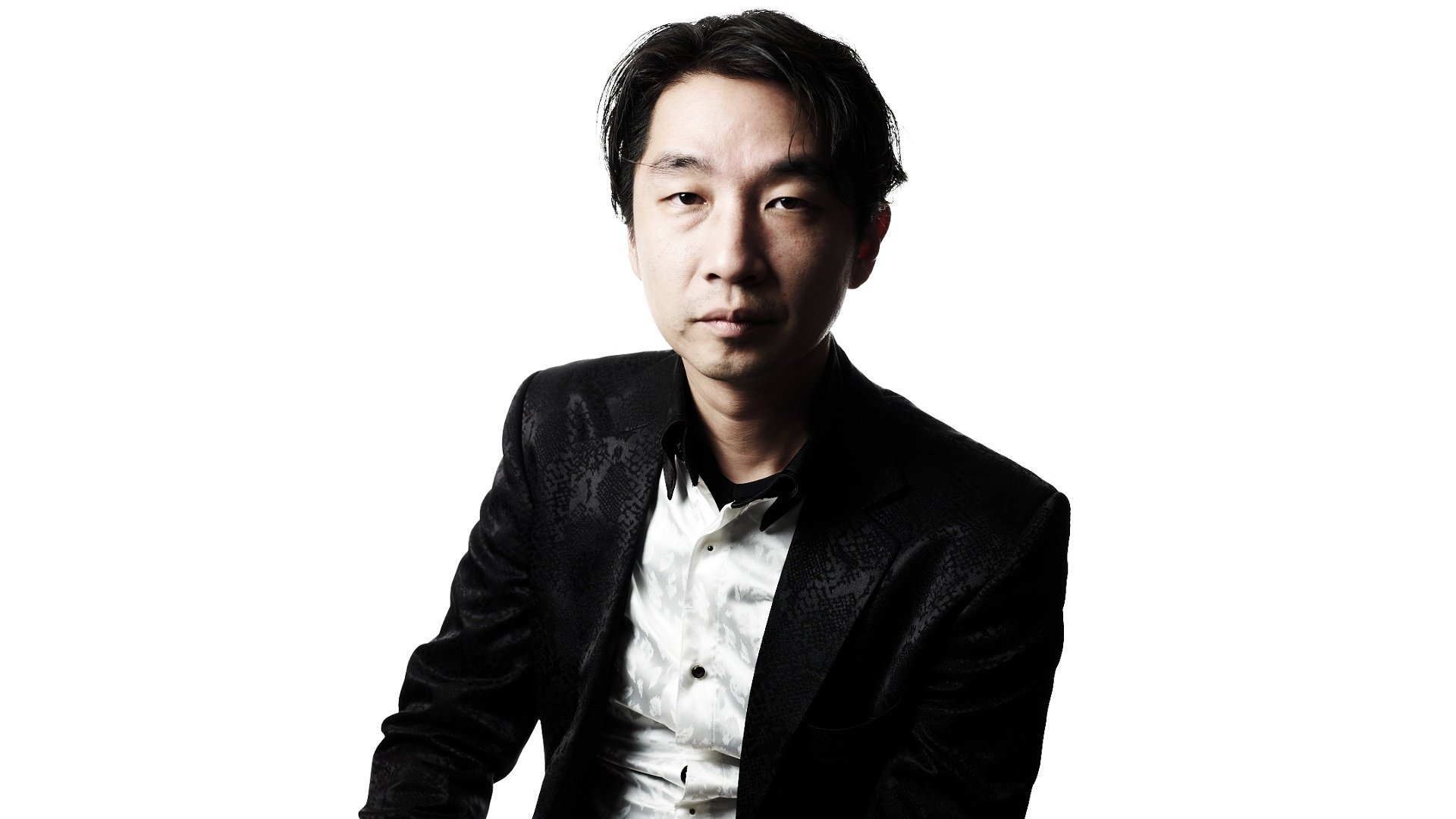 Promotional photograph of Akira Yamaoka.