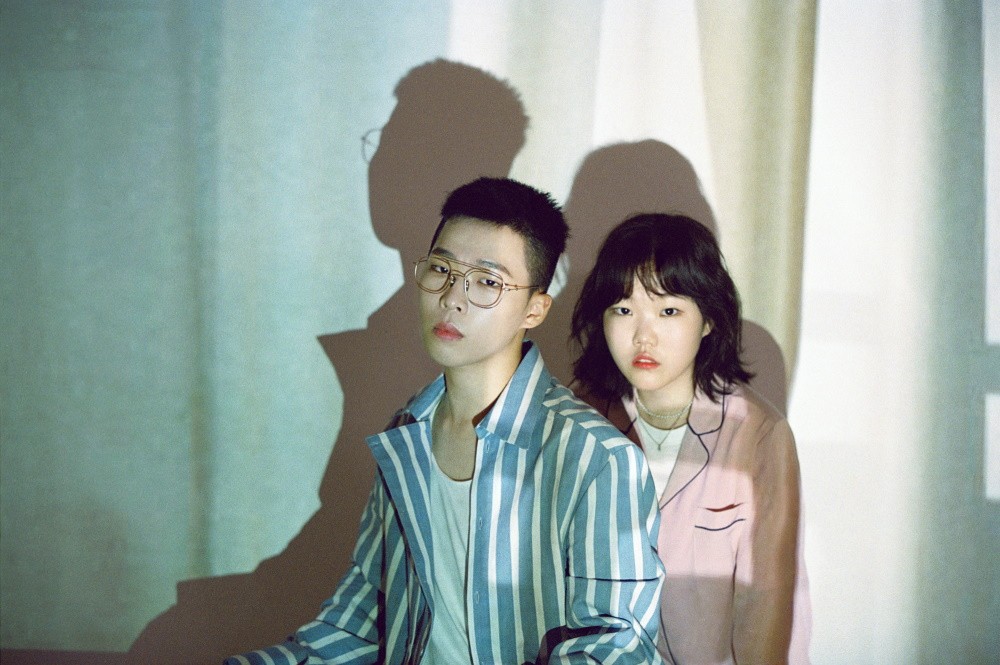 Promotional photograph of AKMU (Akdong Musician).