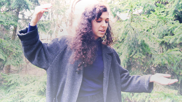 Promotional photograph of Amina Hocine.