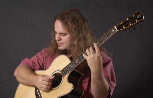 Promofoto von Concierto de Andy McKee en Leeds.