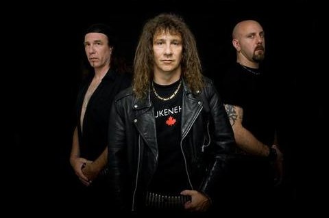 Promofoto von Concierto de Anvil en Flint.