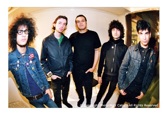 Promotional photograph of At the Drive-In.