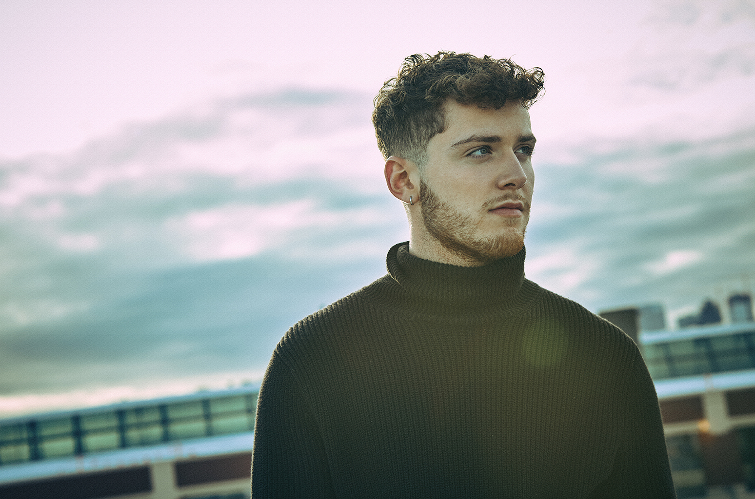 Promotional photograph of Bazzi.