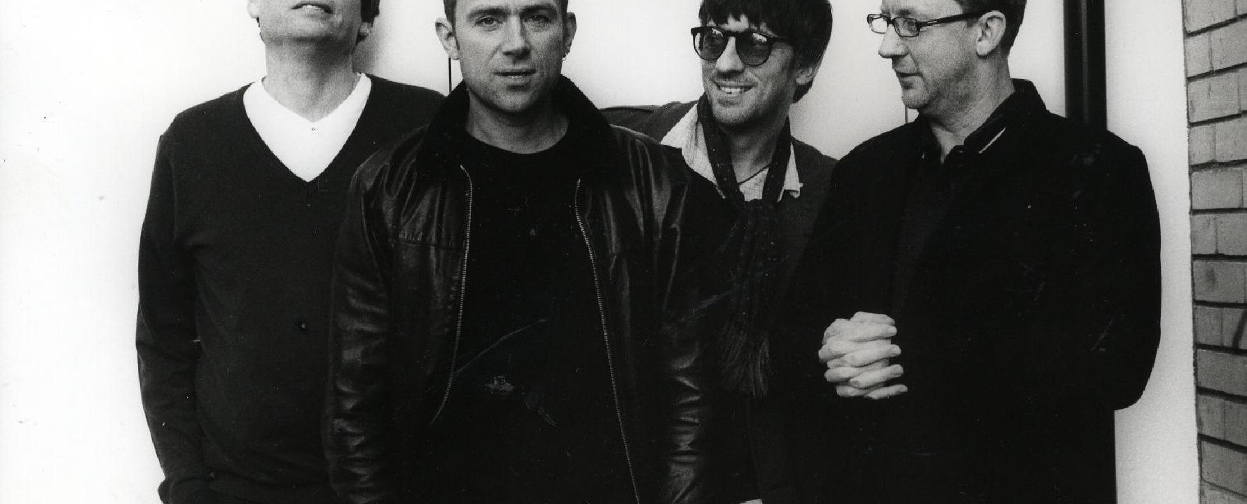 Promotional photograph of Blur.
