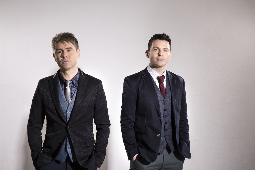 Promotional photograph of Byrne and Kelly.