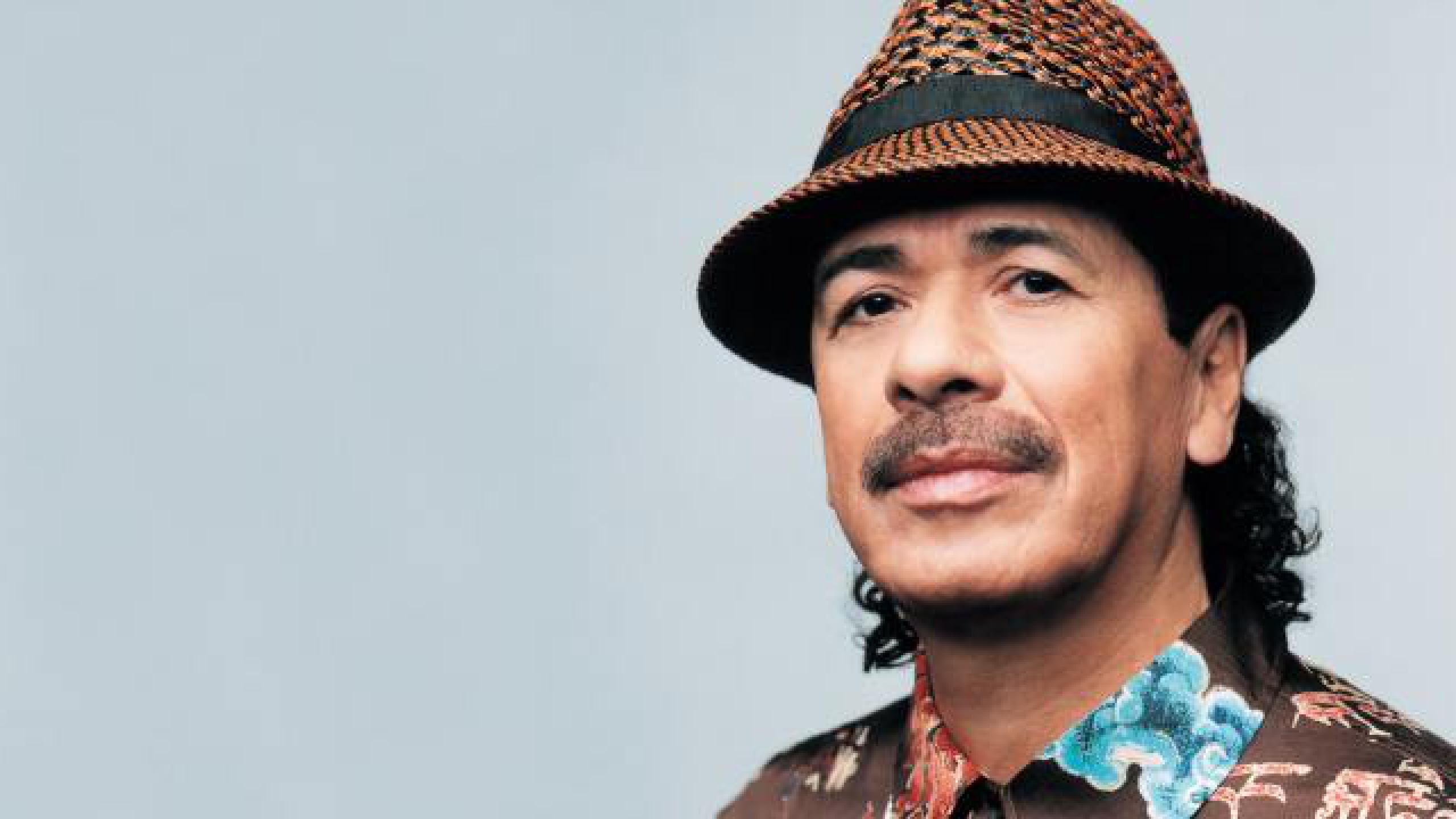 https://cdn.wegow.com/media/artists/carlos-santana/carlos-santana-1492554491.27.2560x1440.jpg