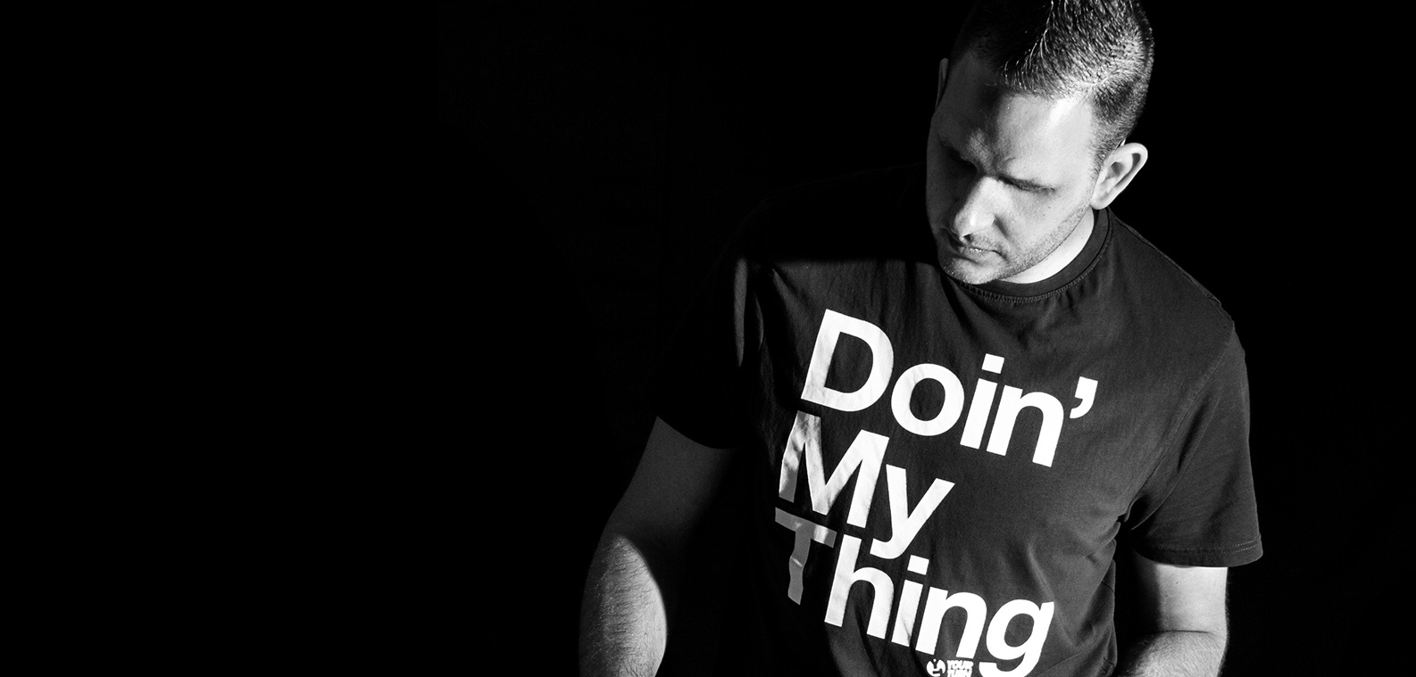 Promotional photograph of Chris Deluxe.