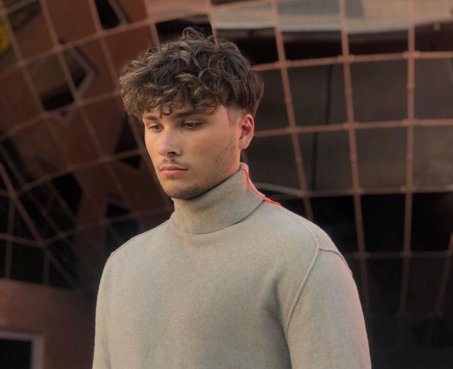 Promotional photograph of Damien.