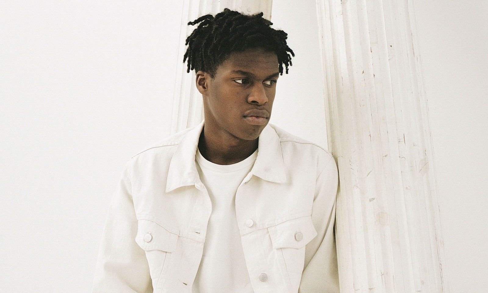 Promotional photograph of Daniel Caesar.