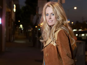 Promotional photograph of Deana Carter.