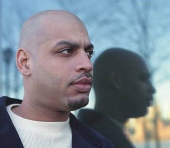 Promotional photograph of Dennis Ferrer.