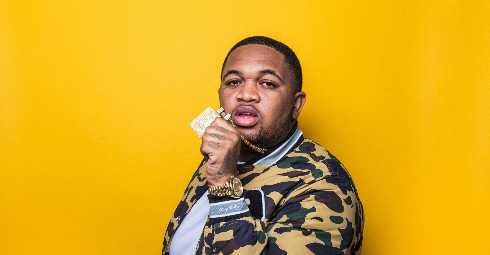Promotional photograph of DJ Mustard.