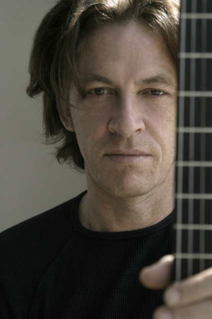 Promotional photograph of Dominic Miller.