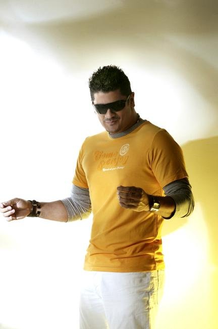 Promotional photograph of Eddy Herrera.