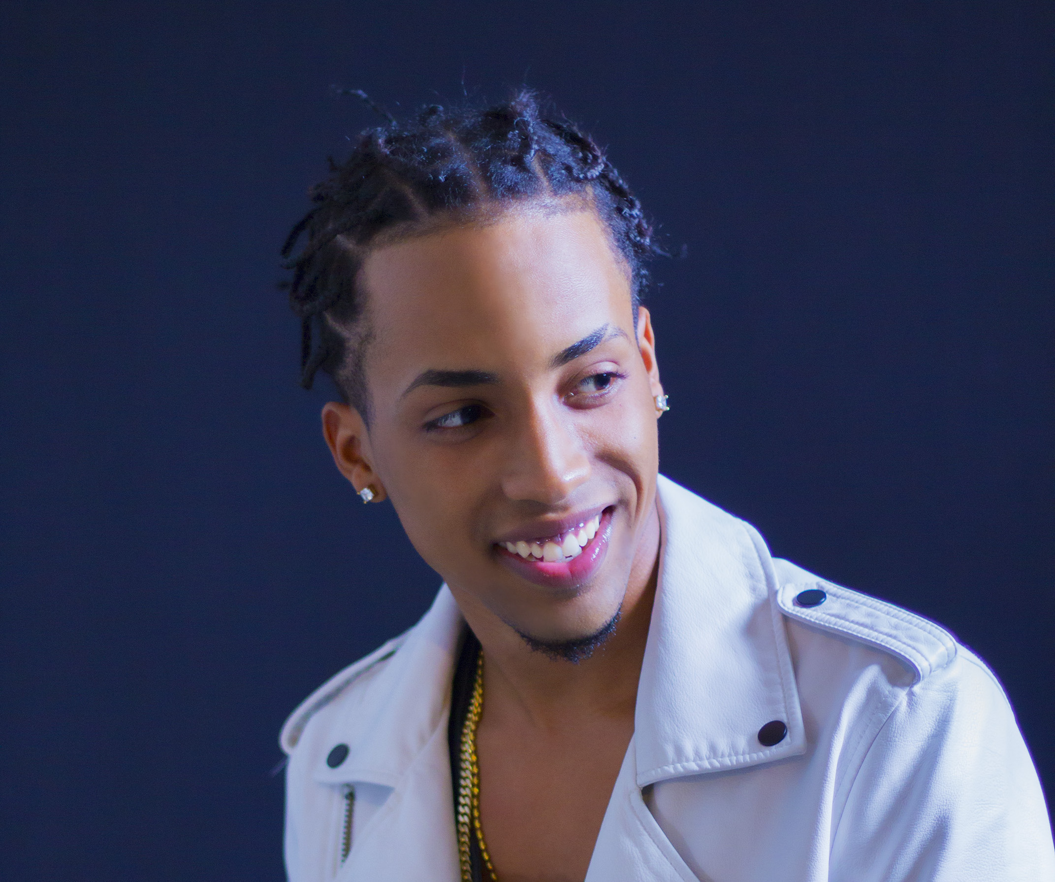 Promotional photograph of El Nene La Amenazzy.