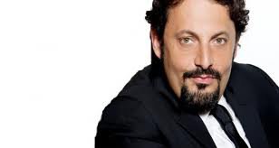 Promotional photograph of Enrico Brignano.