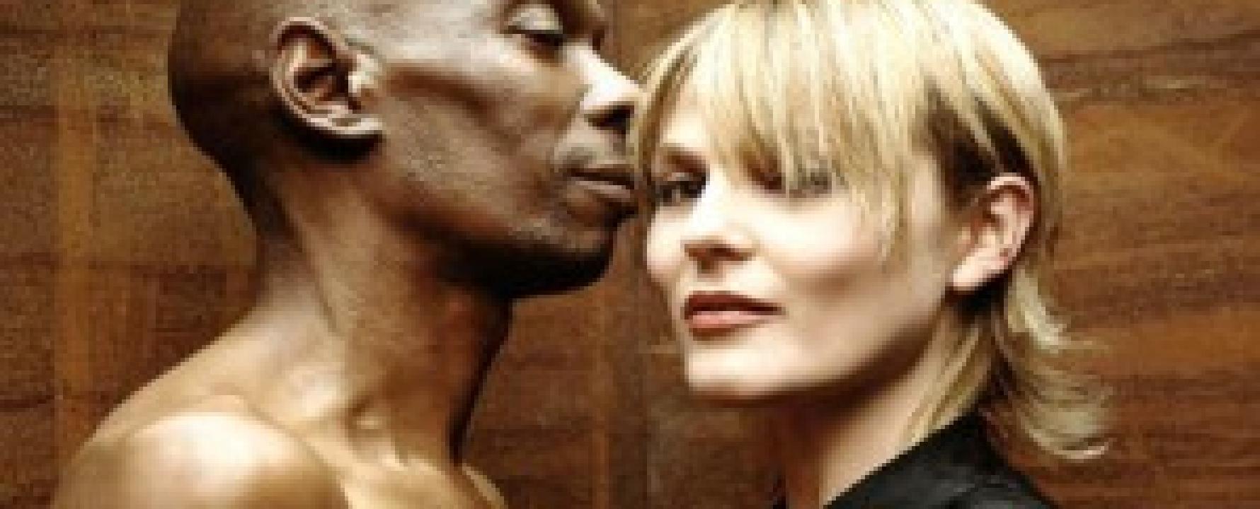 Promotional photograph of Faithless.