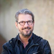 Promotional photograph of Felix Reuter.