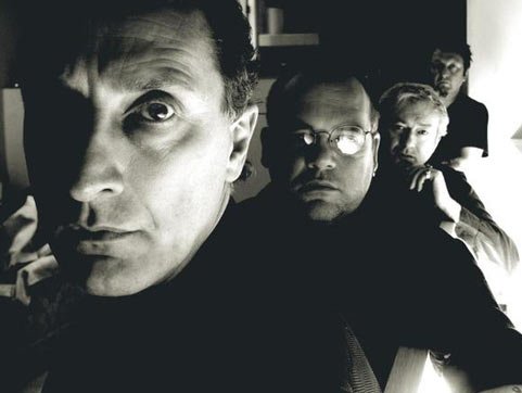 Promotional photograph of Gang of Four.