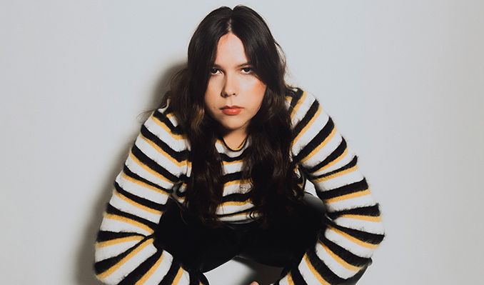 Promotional photograph of Gigi Perez.