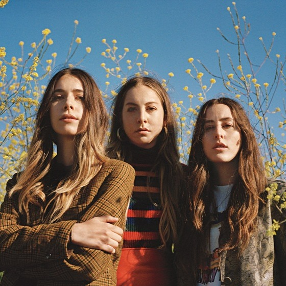 Promotional photograph of Haim.