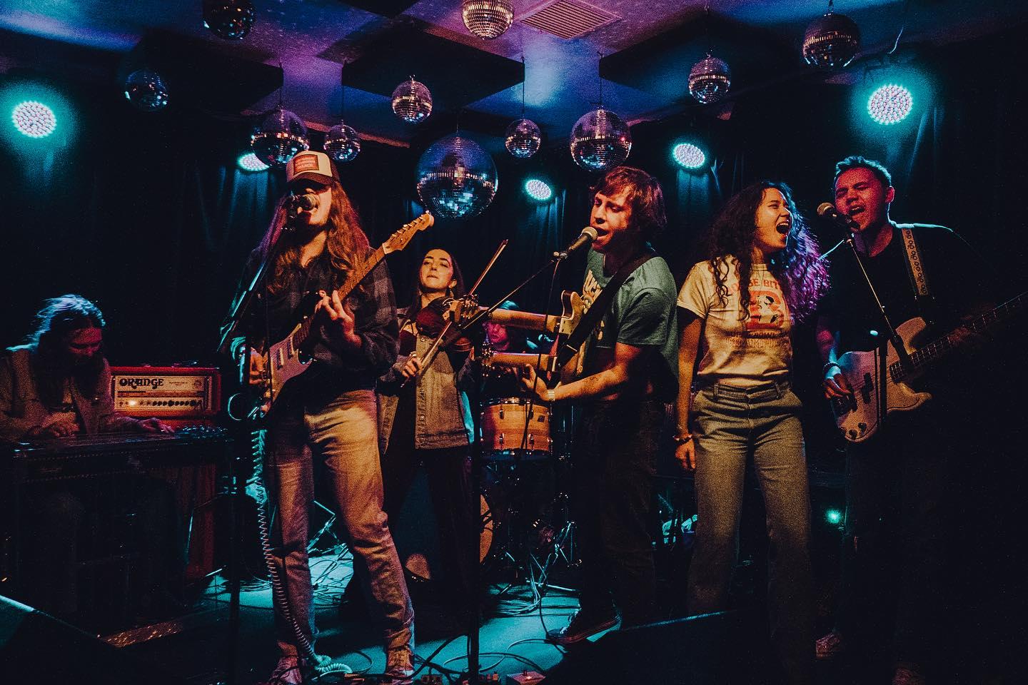 Fotografia promocional de Concierto de Motherfolk en Boise.