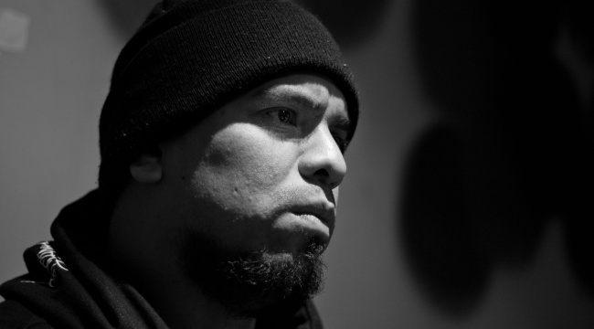 Promotional photograph of Immortal Technique.