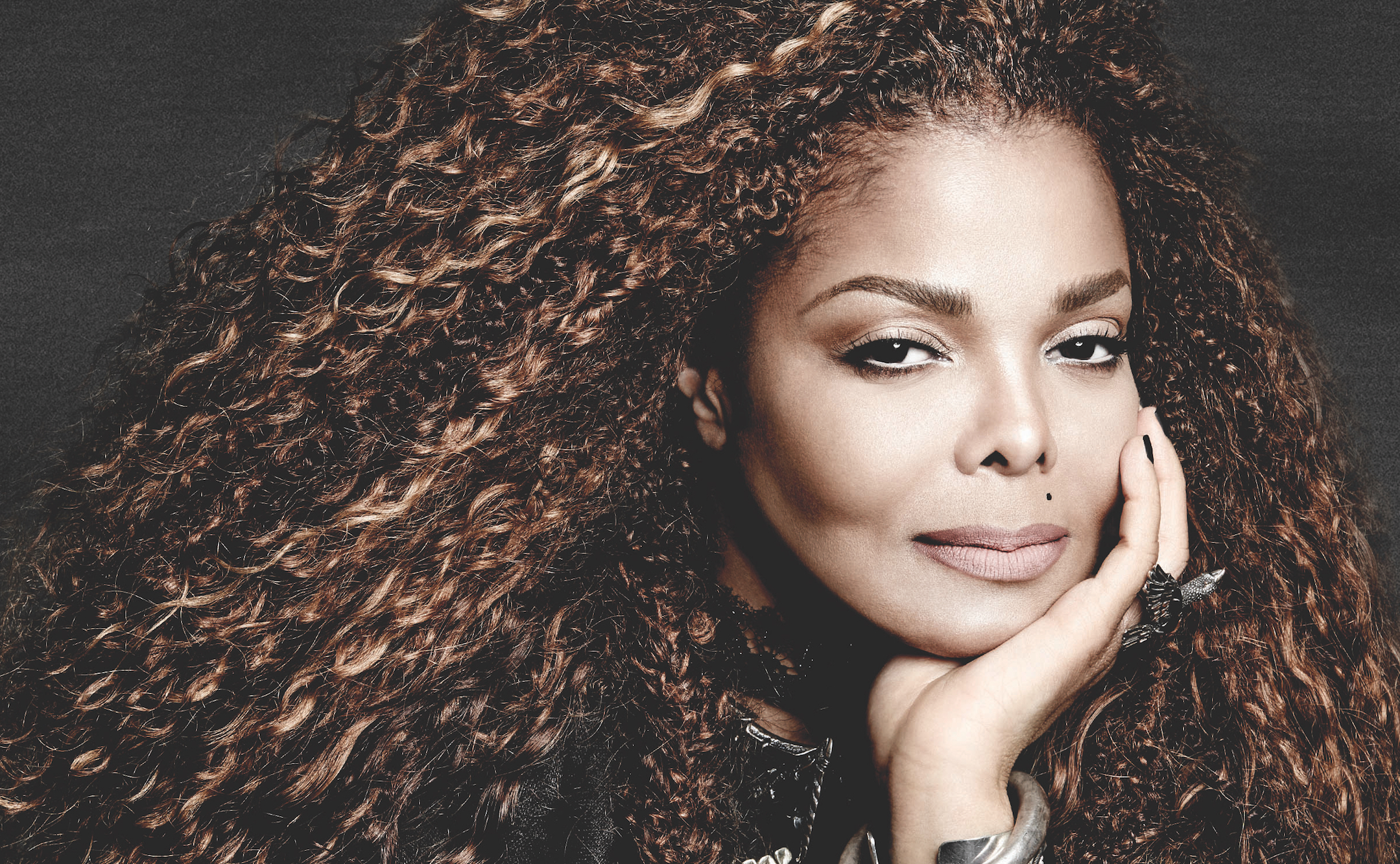 Promotional photograph of Janet Jackson.