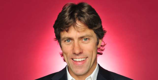 Promotional photograph of John Bishop.