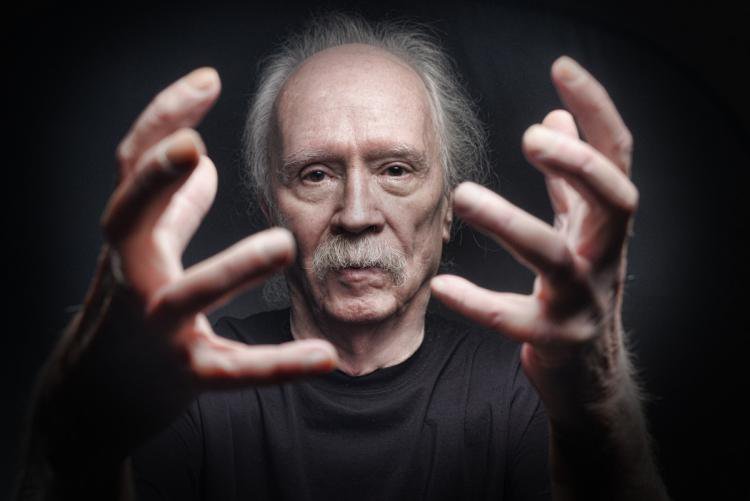 Promotional photograph of John Carpenter.