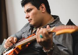 Promotional photograph of John Del Toro Richardson.