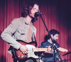 Promotional photograph of John Dominy.