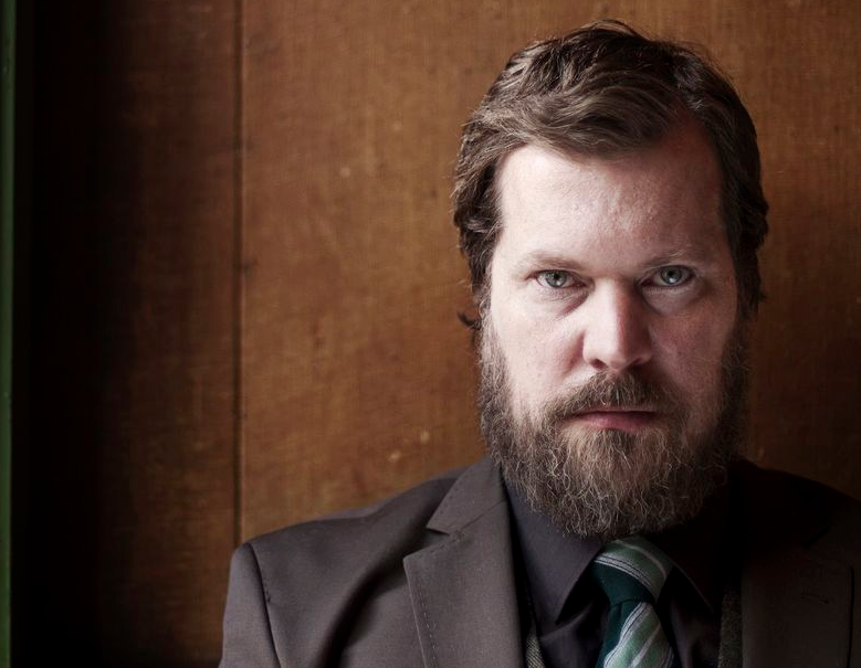 Promotional photograph of John Grant.