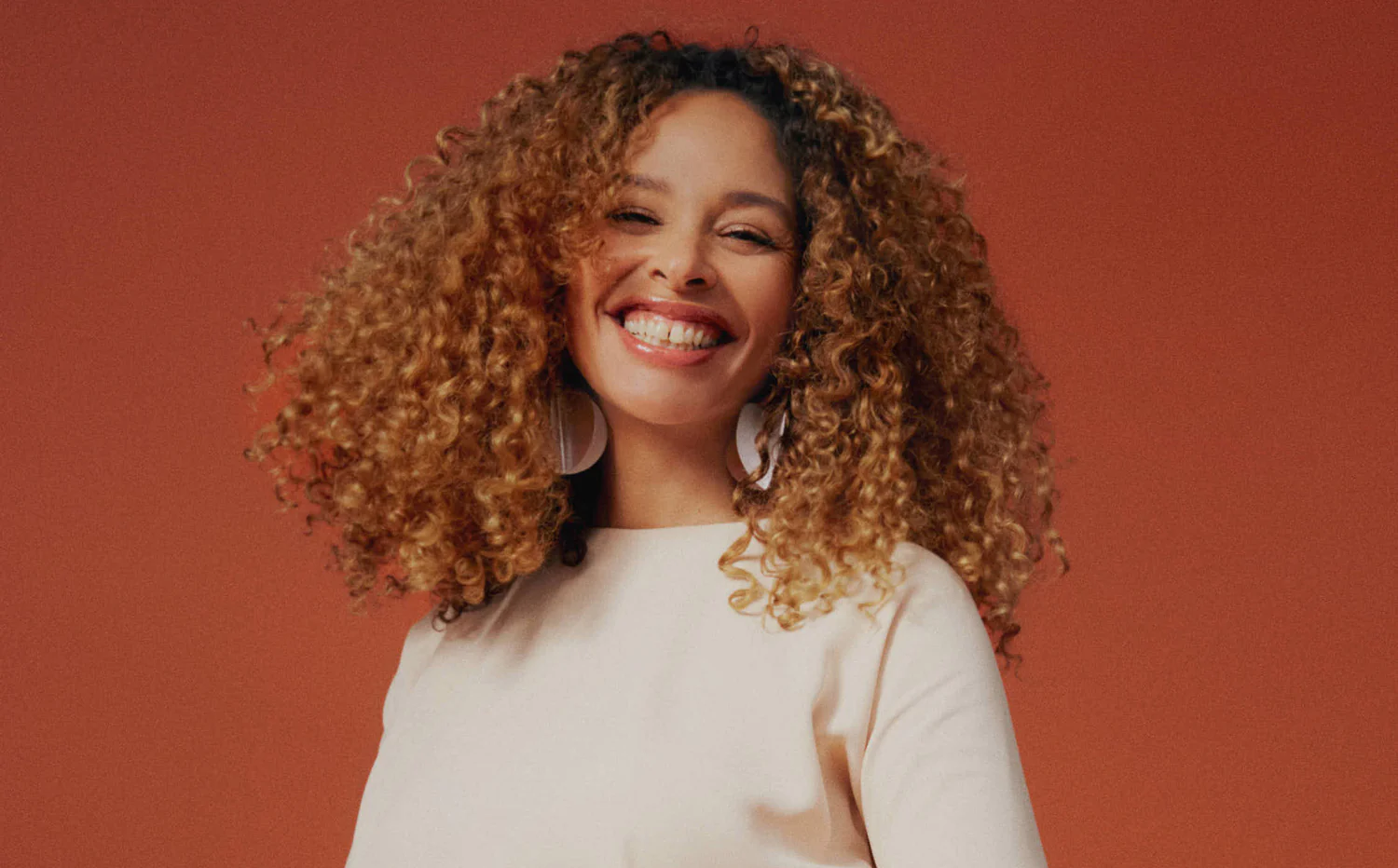 Promotional photograph of Joy Denalane.