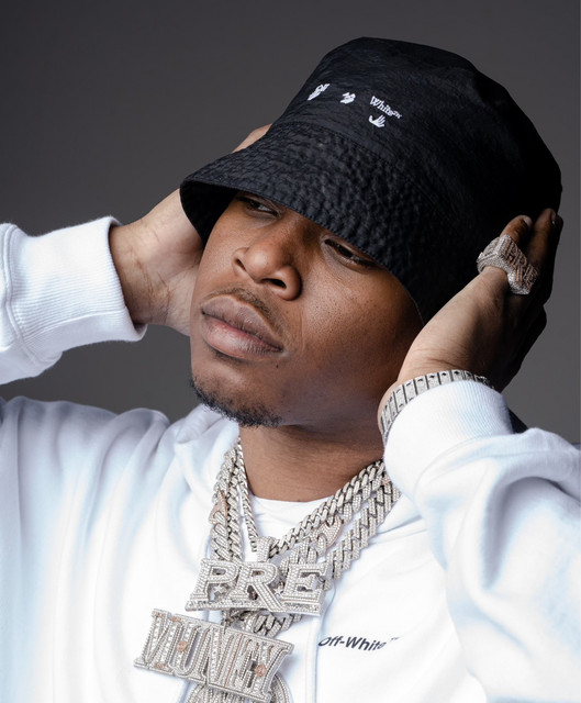 Promotional photograph of Kenny Muney.