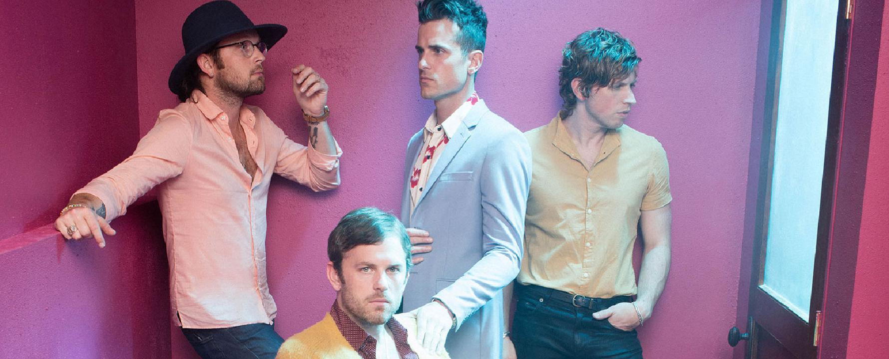 Promotional photograph of Kings of Leon.