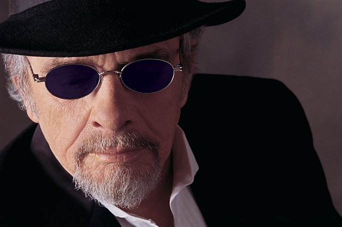 Fotografia promocional de Merle Haggard.