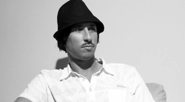 Promotional photograph of Miguel Migs.