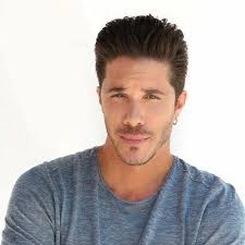 Promotional photograph of Nikos Oikonomopoulos.