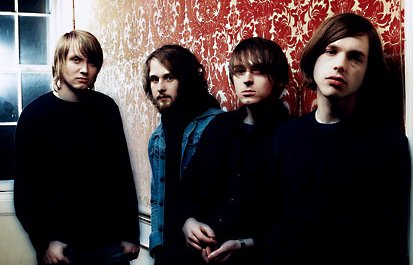 Promotional photograph of Nine Black Alps.