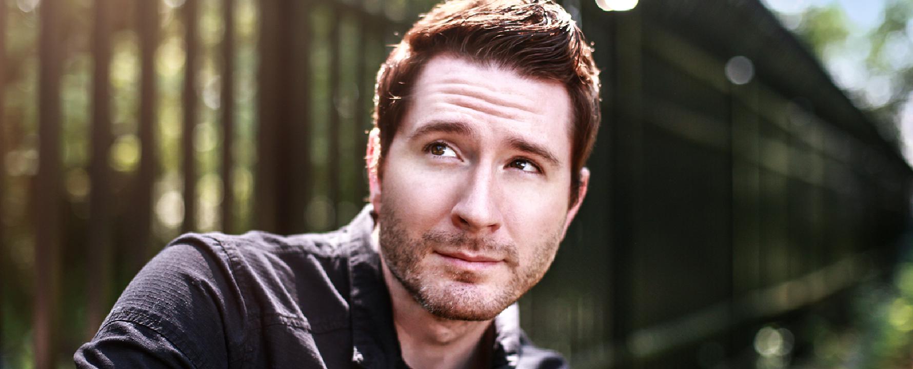 Promotional photograph of Owl City.